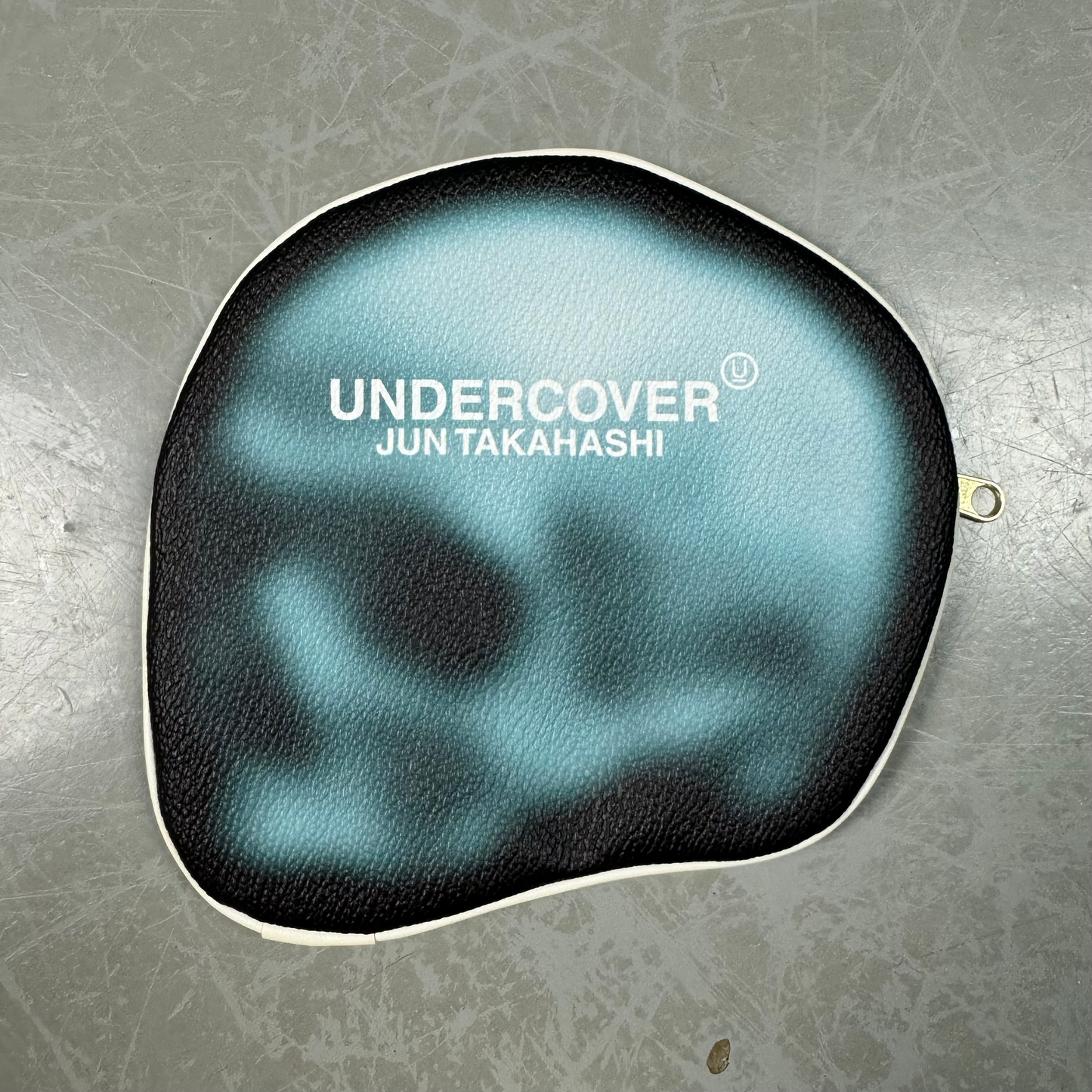 S/S 2024 Undercover “Deep Mist” Faux Leather Skull Pouch image 0